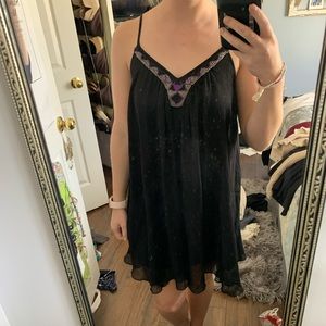 Black spaghetti strap dress with sequin detail